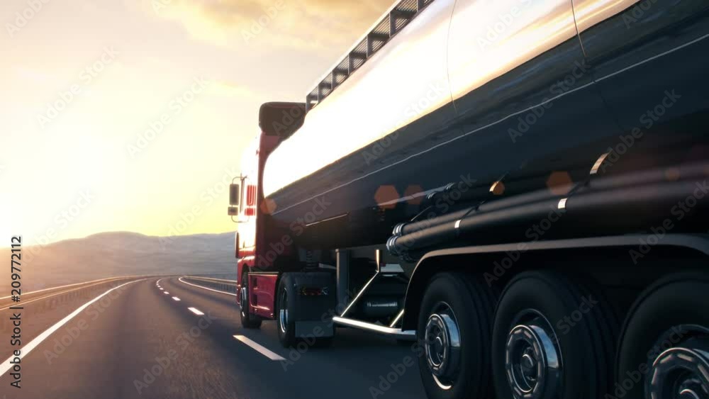 The camera follows a tank truck driving along a desert highway into the sunset. Low angle rear view camera. Realistic high quality 3d animation. The camera follows a tank truck driving along a desert highway into the sunset. Low angle rear view camera. Realistic high quality 3d animation.