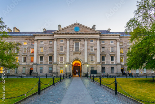 View of a building on the parliament square inside of the trinity college campus in Dublin, Ireland photo