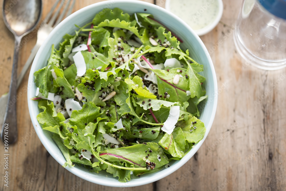 Quinoa & baby kale salad with sunflower seeds, shredded coconut, mixed quinoa and mint yoghurt dressing Quinoa & baby kale salad with sunflower seeds, shredded coconut, mixed quinoa and mint yoghurt dressing