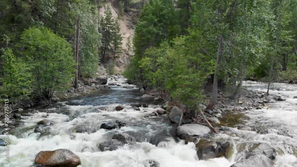 drone over mountain river drone over mountain river