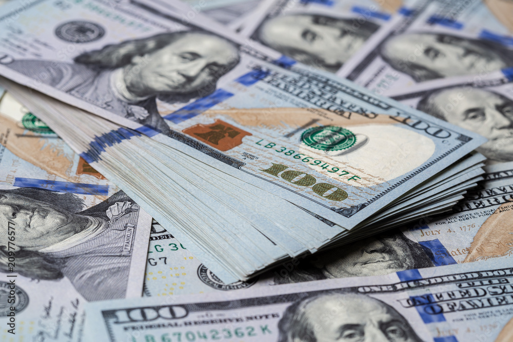 Cash of hundred dollar bills, dollar background. Cash of hundred dollar bills, dollar background.