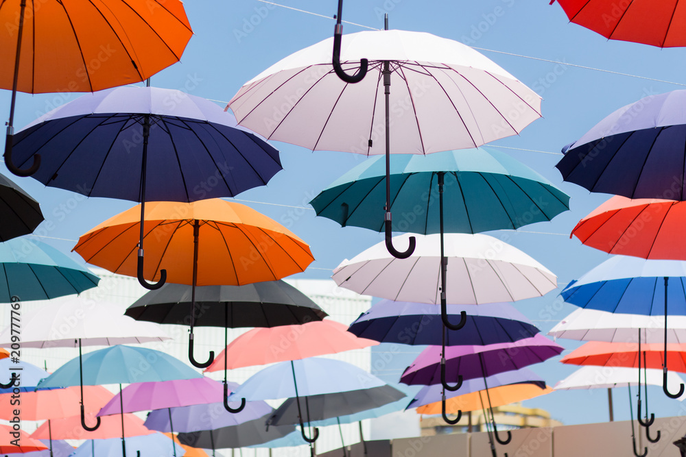Avenue of floating umbrellas