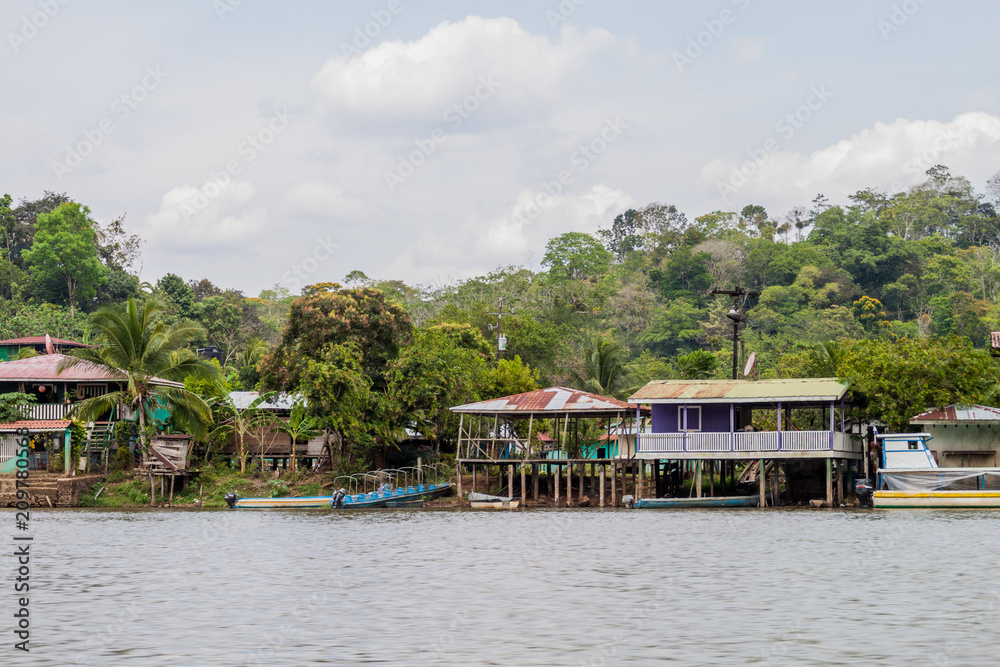 Riverside houses in Ell Castillo village at San Juan river, Nicaragua Riverside houses in Ell Castillo village at San Juan river, Nicaragua
