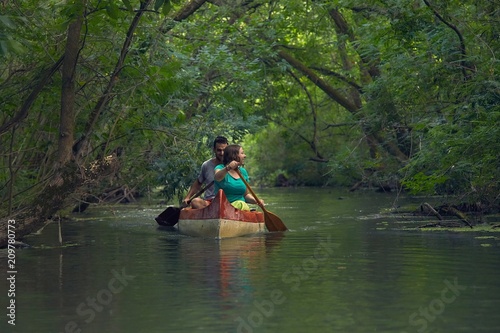Canoe tour on a river © Gudellaphoto