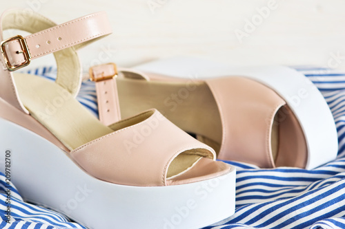 New, leather fashionable sandals on a wedge. Fashion & Style.