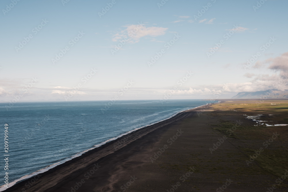 Shore with cliff shadow in iceland