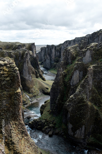 Back view of huge canyon with river in iceland