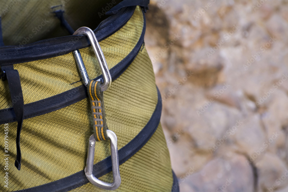 rock climbing gear and carabiners on rock wall at maple canyon utah which is a popular destination for rock climbers rock climbing gear and carabiners on rock wall at maple canyon utah which is a popular destination for rock climbers