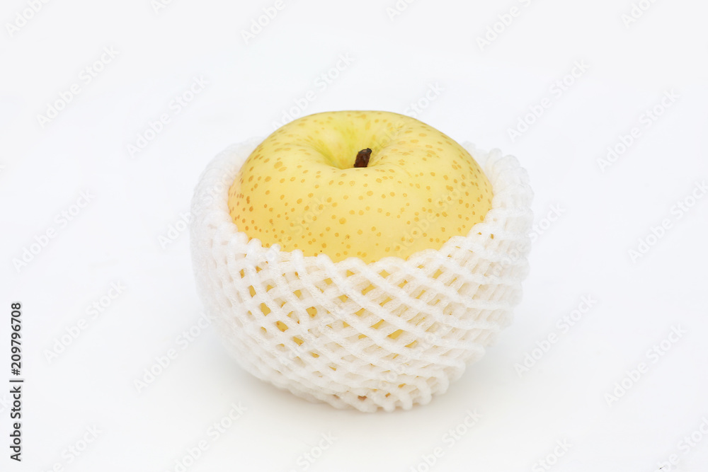 Chinese pear in bubble wrapped on white background.