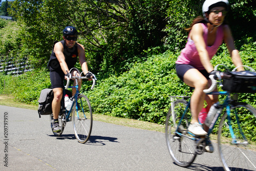 Bicycle riders on the Burke Gilman trail photo