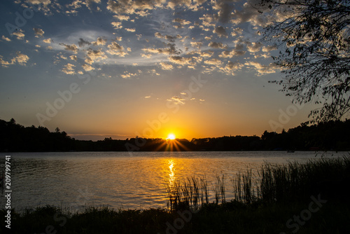 Summer sunset over lake in Minnesota