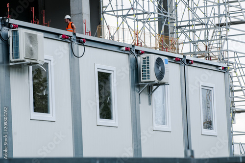 Prefabricated rooms for workers on the building