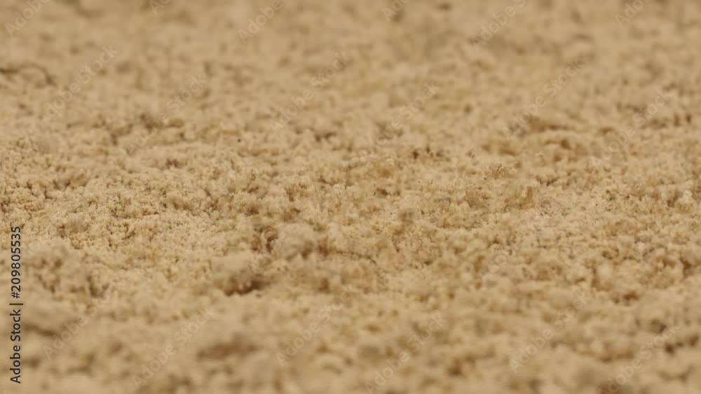 MACRO: Shaking of ginger powder - Slow motion MACRO: Shaking of ginger powder - Slow motion