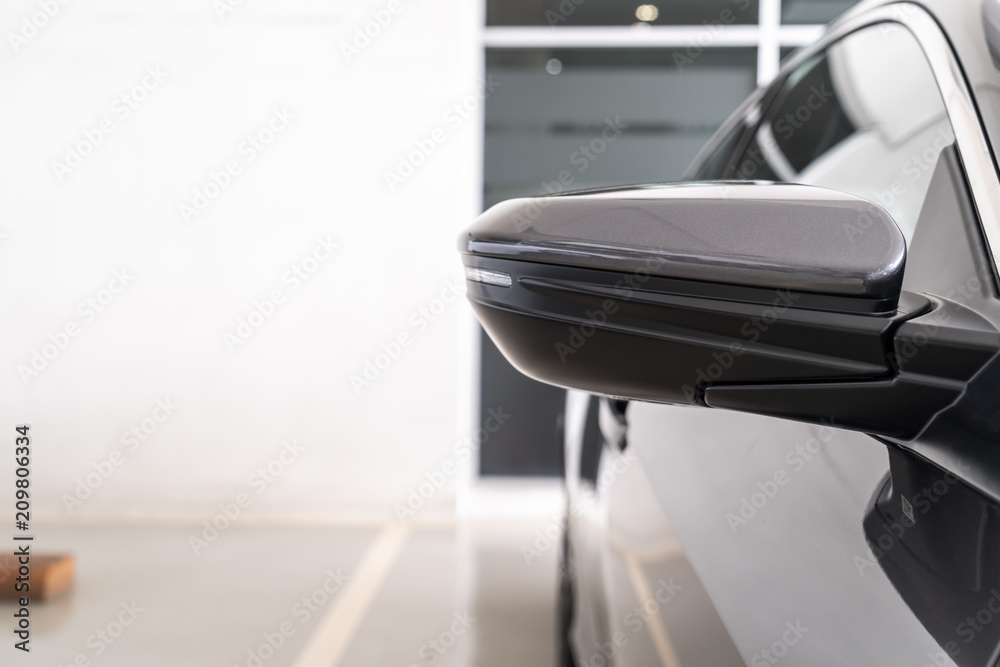 Fototapeta premium side rear-view mirror on car