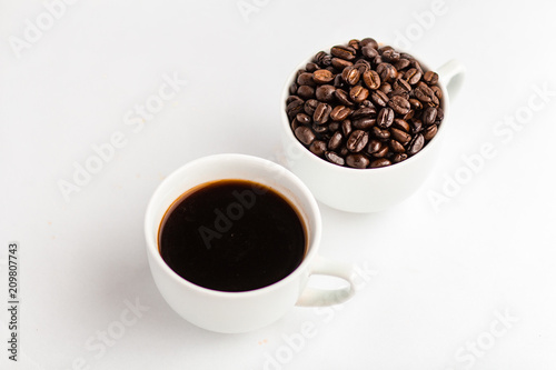 Coffee and coffee beans in white cups  white background