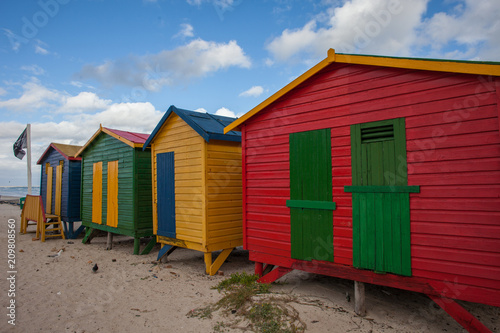 Colorful Wooden Beach Huts © DaiMar
