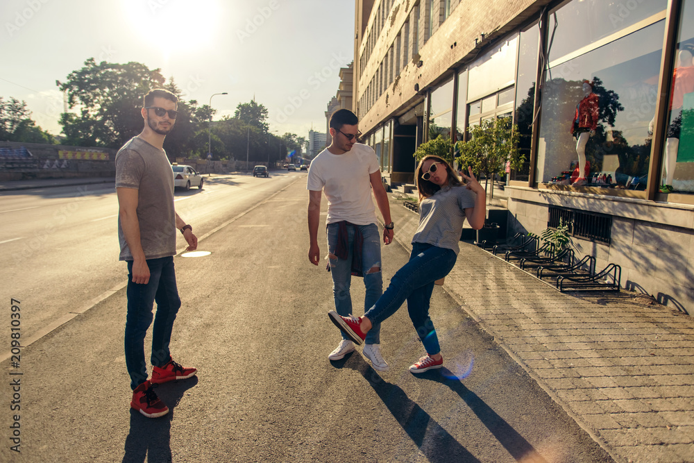 Group of friends having fun in down town