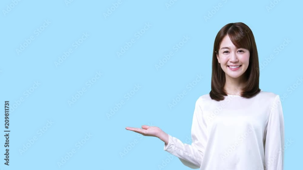 案内する女性 案内する女性