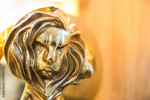 Closeup of gold cannes lion trophy, Shoot at Cannes lions festival 2017, France photo