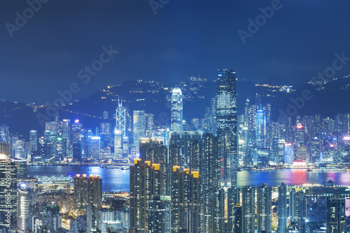 Panorama of Victoria Harbor of Hong Kong city at night