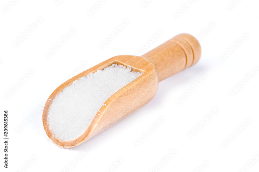 White sugar in wooden scoop isolated on white background White sugar in wooden scoop isolated on white background