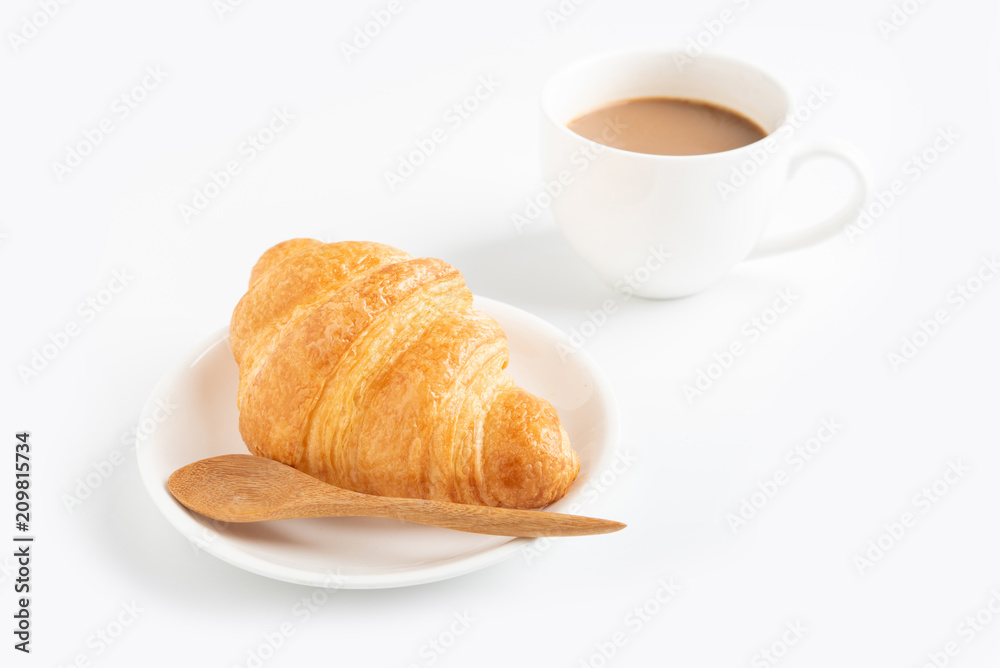 Coffee and croissant on white background Coffee and croissant on white background