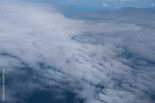 Fototapeta Naklejka Na Ścianę i Meble -  Clouds, a view from airplane window