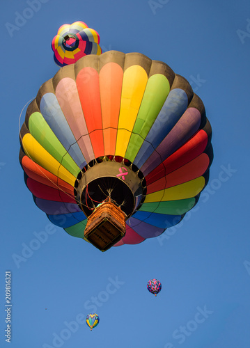 Four Hot Air Balloons Flying High in the Clear, Blue Sky at the Hot Air Balloon & Kite Festival in Grants Pass, Oregon