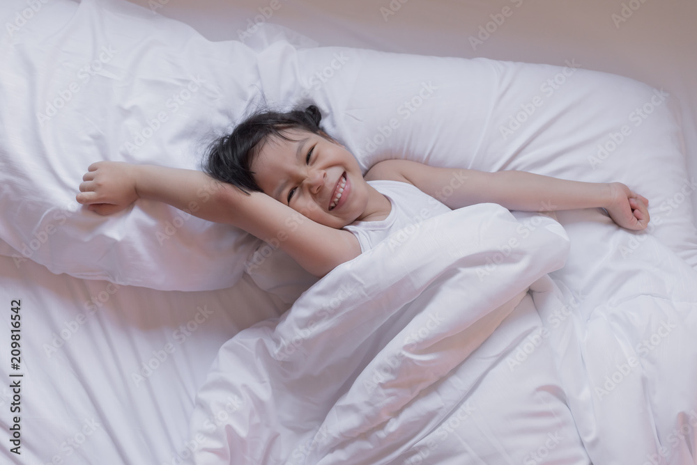 health and beauty concept - little girl sleeping at home health and beauty concept - little girl sleeping at home
