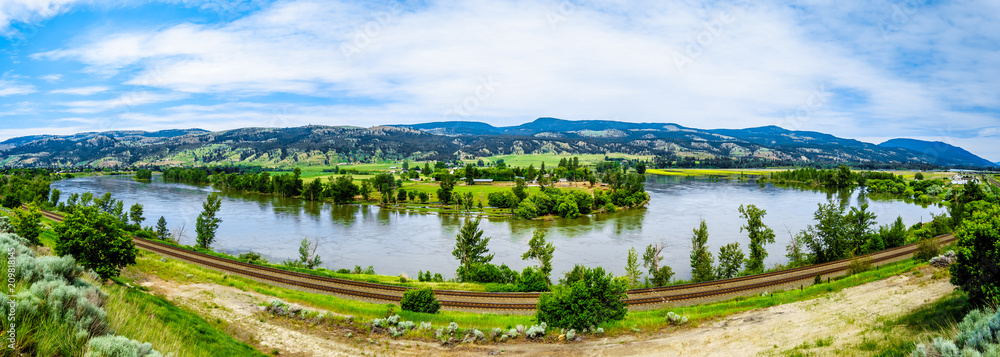 Panorama view of the North Thompson River at Flood Stage between Clearwater and Little Fort in British Columbia, Canada during spring run off in the Cariboo Mountains
