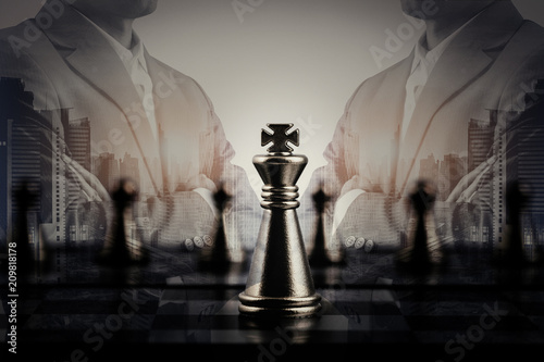 Double exposure of businessman with chess board game of business ideas and competition and competition success play strategy, management or leadership concept
