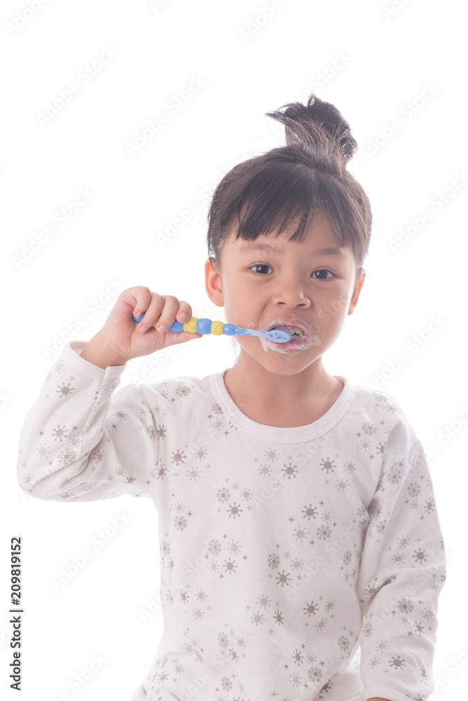 Little girl brushing her teeth isolated on white background Little girl brushing her teeth isolated on white background