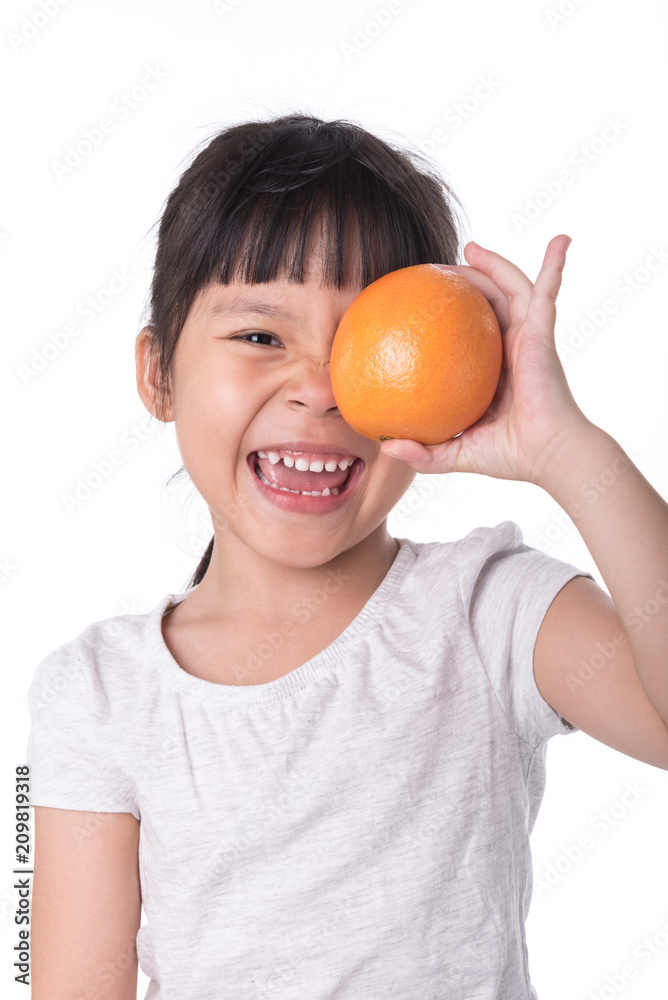 Little girl playing with fresh mandarin fruits, White background Little girl playing with fresh mandarin fruits, White background