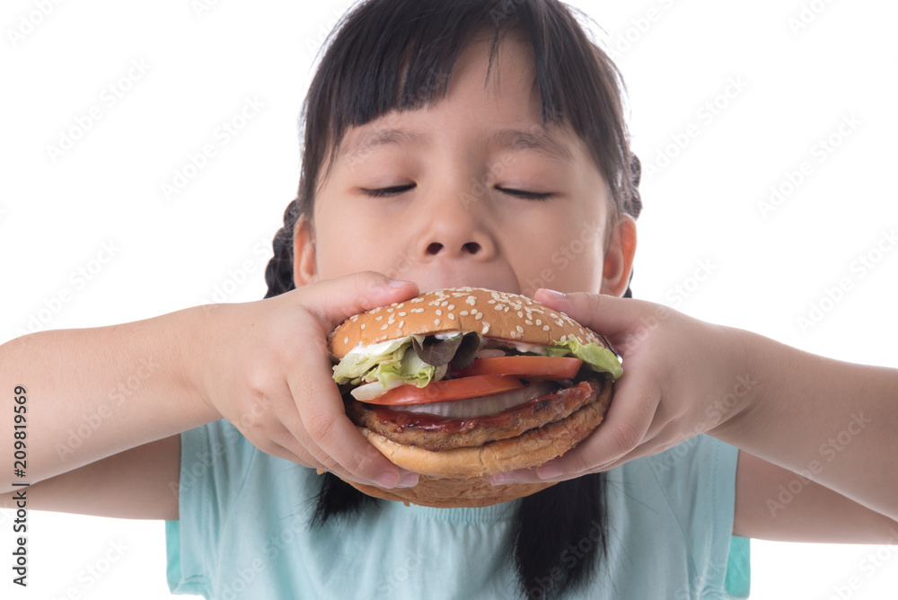 portrait of a beautiful girl, teenager and schoolgirl, holding a hamburger on a white background