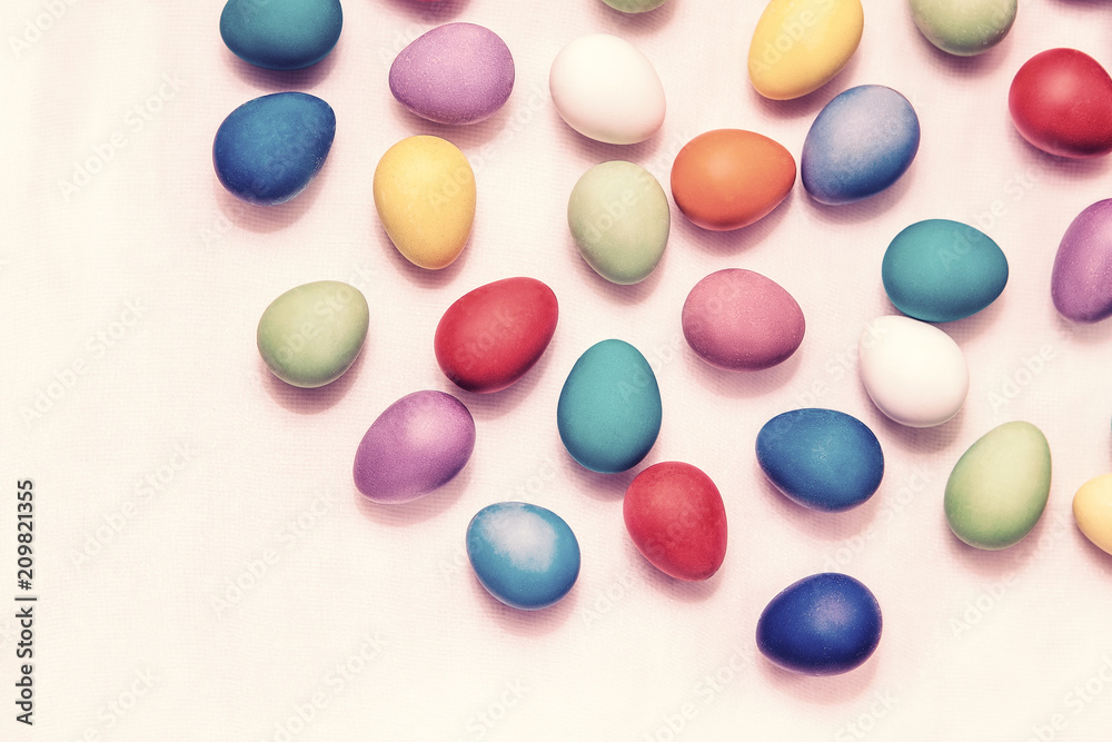 Colorful Easter eggs on a white background. Easter holiday. Painted quail eggs
