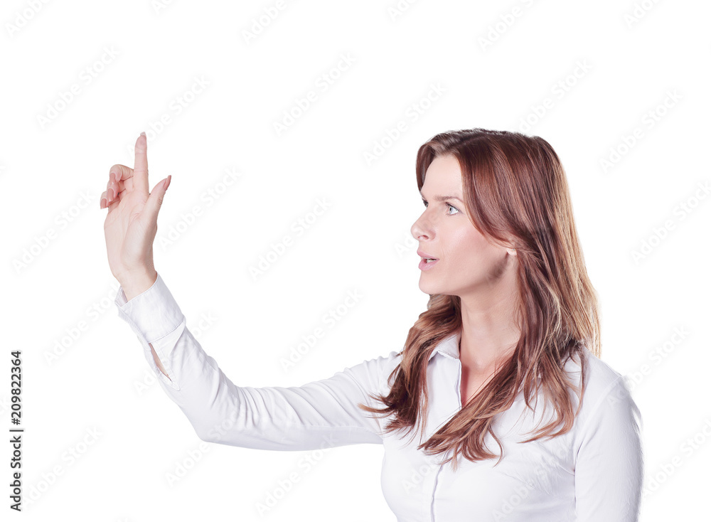 modern successful business woman presses on a virtual button.isolated in the dark modern successful business woman presses on a virtual button.isolated in the dark