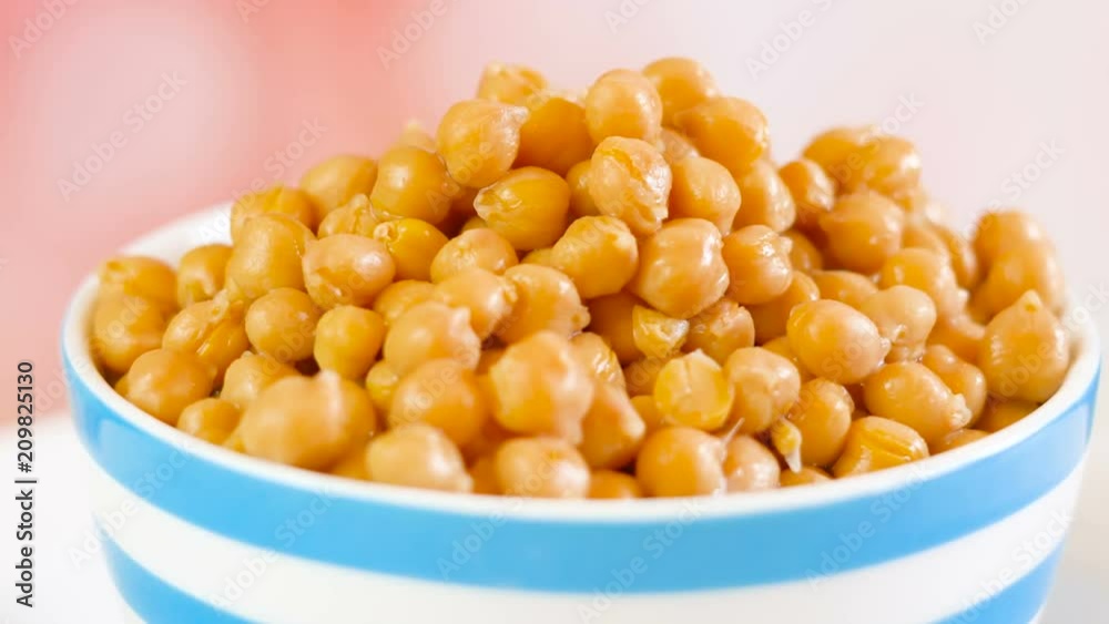 Chickpeas, garbanzo beans, healthy source of dietary fibre and protein, slow turning dolly macro. Chickpeas, garbanzo beans, healthy source of dietary fibre and protein, slow turning dolly macro.
