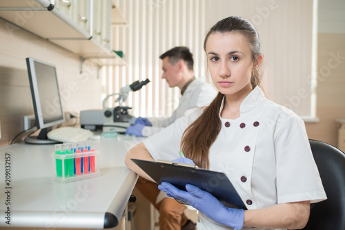 Team working doctors or scientists in the lab