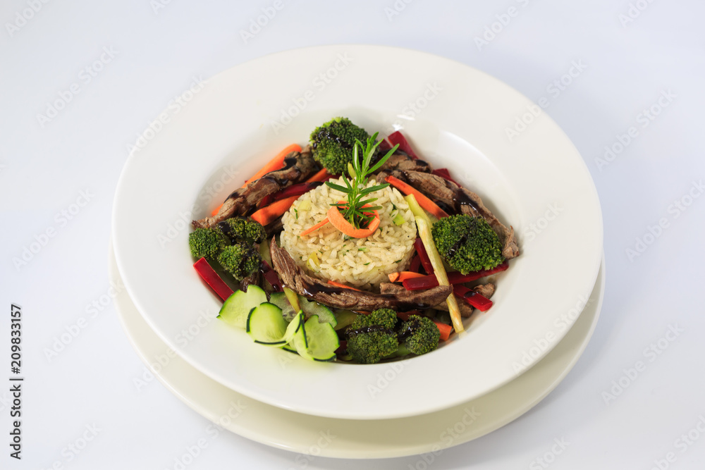 Risotto with vegetables and sliced meat Risotto with vegetables and sliced meat