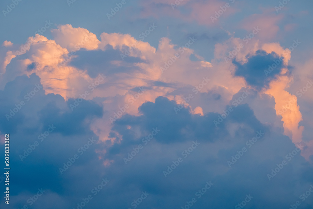 Beautiful sky with blue and pink clouds at sunset