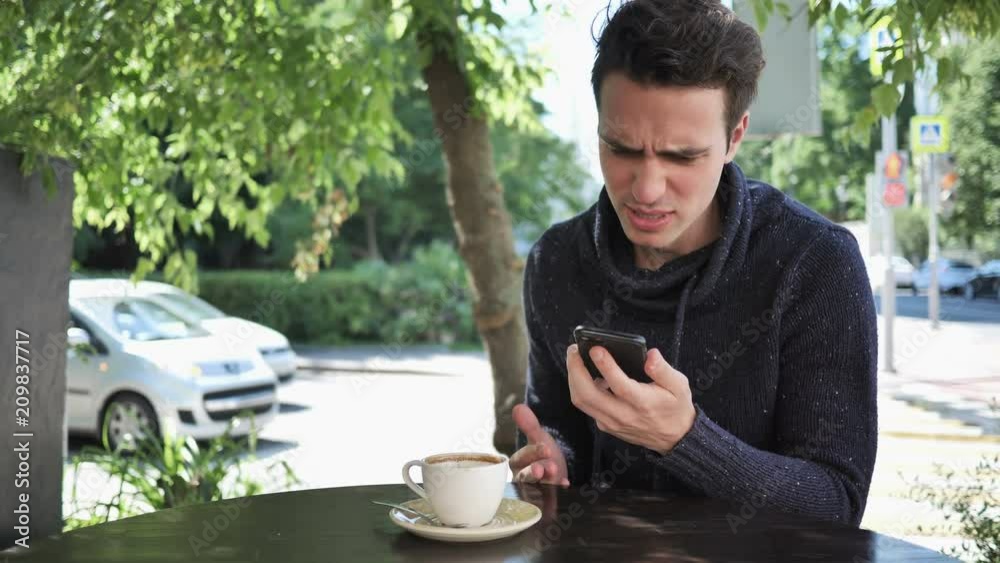 Angry Man Talking on Phone, Fighting and Yelling Angry Man Talking on Phone, Fighting and Yelling