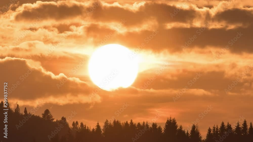 Follow the sun at sunset over forest Time lapse Follow the sun at sunset over forest Time lapse