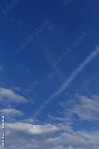 Beautiful blue sky with white clouds as a natural background © westermak15