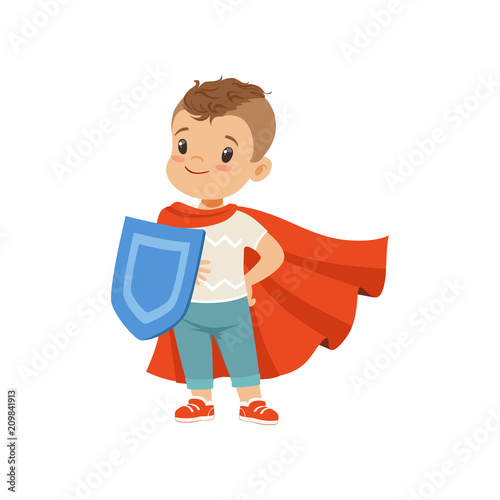Cute brave little boy character in red cape standing with shield vector Illustration on a white background