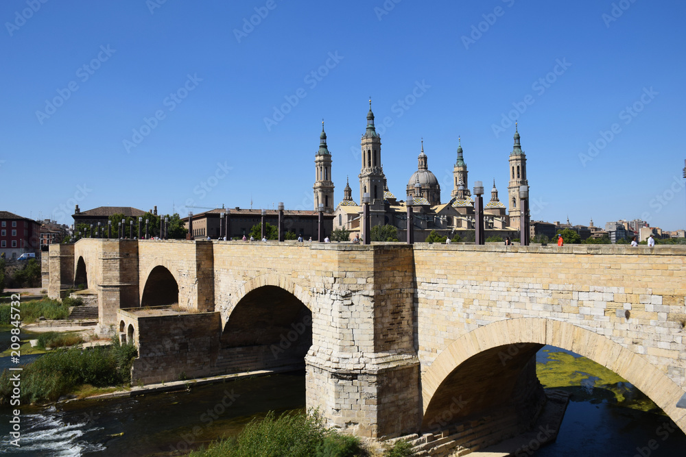 stone bridge over ebro river and pilar chatedral background zaragoza