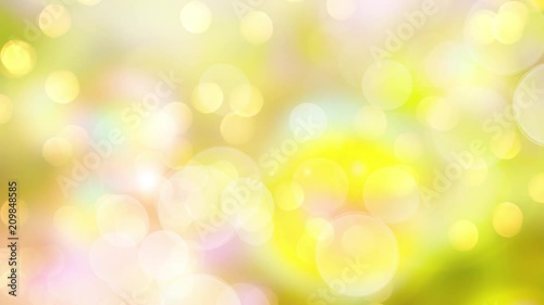 Seamless loop - Nature bright green background with moving bokeh lights