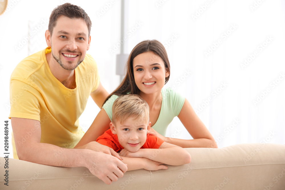 Happy family resting together at home Happy family resting together at home