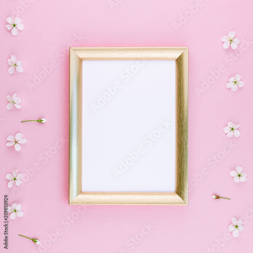 Blank frame mockup with white flowers