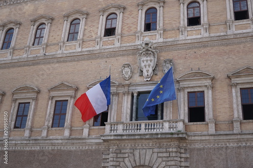 French and European Union flags fluttering photo