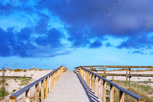 Wooden walkway to the sea at costa nova in Portugal